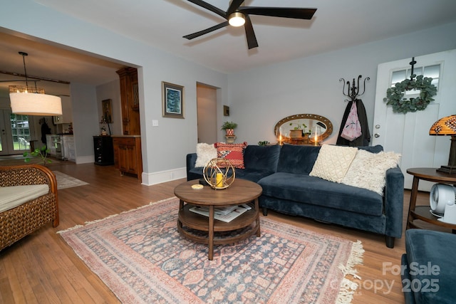 1712 Umstead St, Charlotte, NC 28205 - living area with wood finished floors and ceiling fan