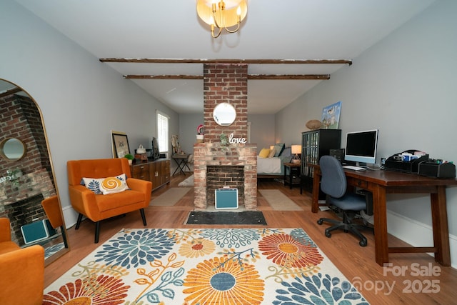 1712 Umstead St, Charlotte, NC 28205 - office space featuring a brick fireplace and wood finished floors