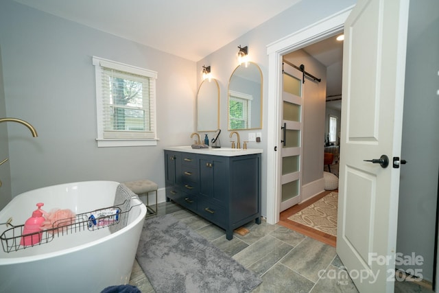 1712 Umstead St, Charlotte, NC 28205 - full bathroom featuring a freestanding bath and double vanity