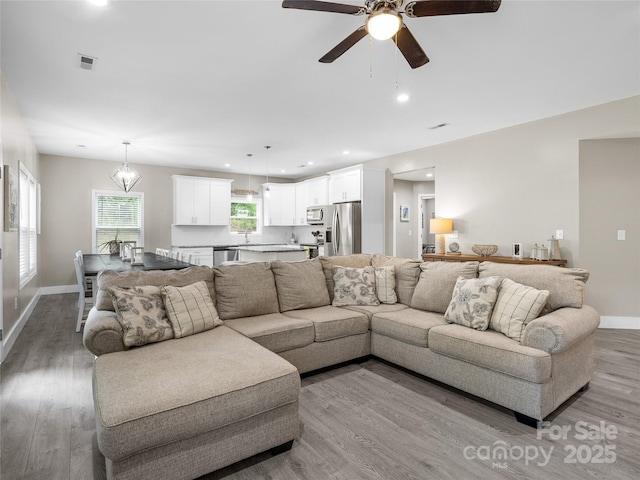 226 Oak Brook Ln Unit 21, Gaffney, SC 29341 - living area with light wood-style floors, ceiling fan, and recessed lighting