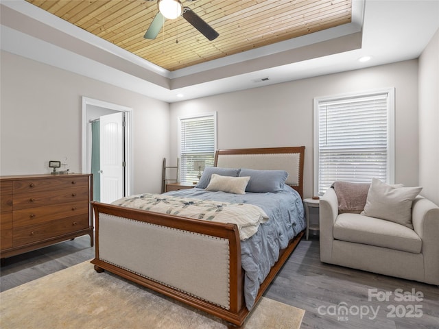 226 Oak Brook Ln Unit 21, Gaffney, SC 29341 - bedroom with wood ceiling, a tray ceiling, wood finished floors, recessed lighting, and ceiling fan
