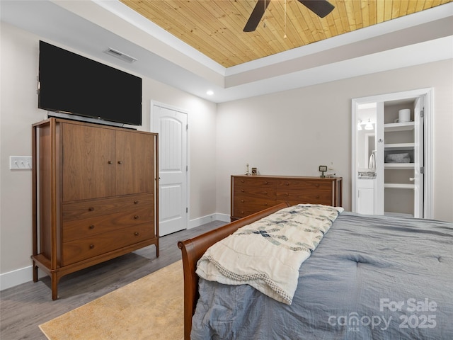 226 Oak Brook Ln Unit 21, Gaffney, SC 29341 - bedroom featuring wood ceiling, wood finished floors, a tray ceiling, recessed lighting, and connected bathroom