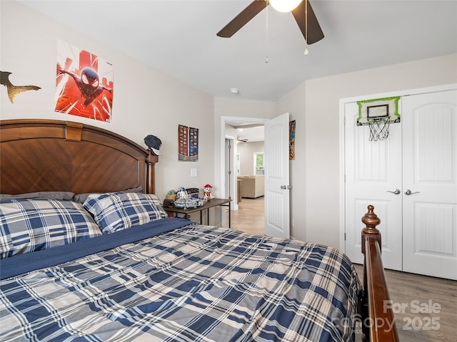 226 Oak Brook Ln Unit 21, Gaffney, SC 29341 - bedroom with wood finished floors, ceiling fan, and a closet