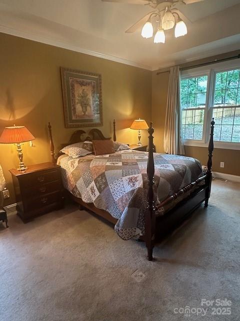 104 Whimbrel Ln, Mooresville, NC 28117 - carpeted bedroom with a ceiling fan and ornamental molding