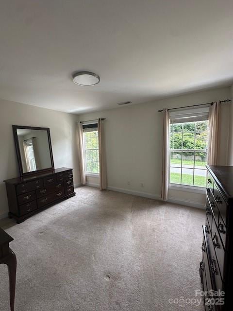 104 Whimbrel Ln, Mooresville, NC 28117 - unfurnished bedroom featuring carpet flooring and baseboards