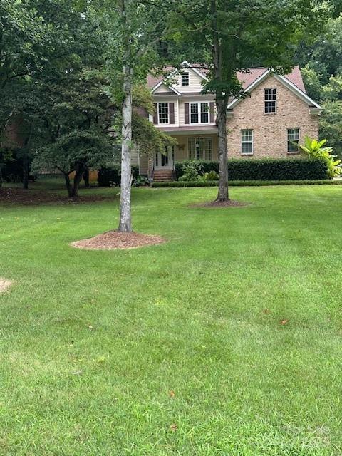 104 Whimbrel Ln, Mooresville, NC 28117 - view of front of house featuring a front lawn