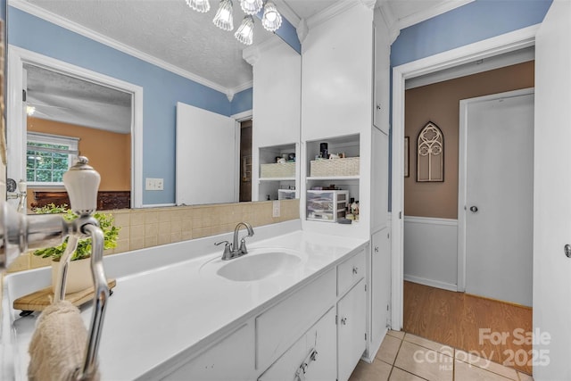 116 Eastwood Park Dr SE, Lenoir, NC 28645 - bathroom with tile patterned flooring, ornamental molding, vanity, and a textured ceiling