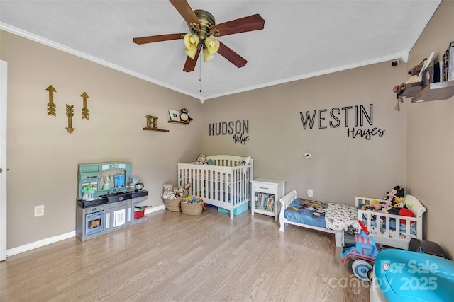 116 Eastwood Park Dr SE, Lenoir, NC 28645 - bedroom with wood finished floors, crown molding, and ceiling fan
