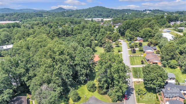 116 Eastwood Park Dr SE, Lenoir, NC 28645 - aerial view of property and surrounding area featuring a forest and a mountainous background