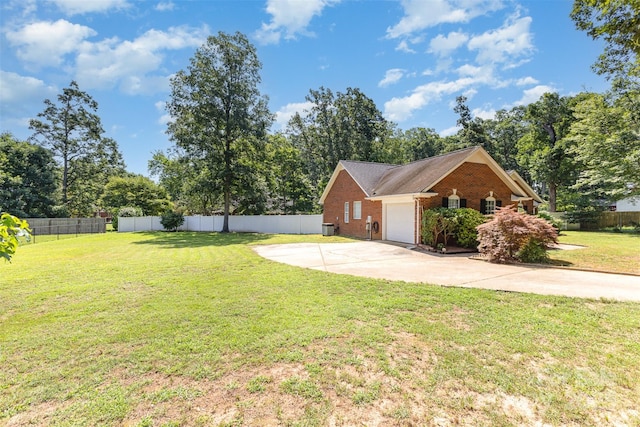 2916 Northwood Dr, Monroe, NC 28110 - view of yard featuring an attached garage and driveway