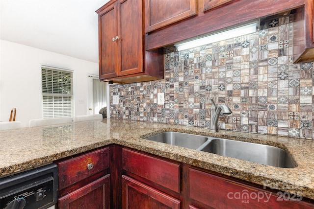 2916 Northwood Dr, Monroe, NC 28110 - kitchen featuring dark brown cabinets, backsplash, light stone countertops, and black dishwasher