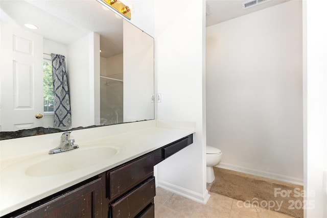 2916 Northwood Dr, Monroe, NC 28110 - bathroom with vanity, tile patterned flooring, curtained shower, and recessed lighting