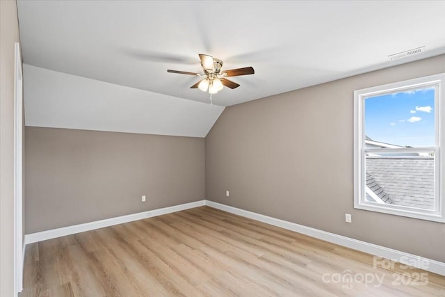 1033 12th Avenue Dr NW, Hickory, NC 28601 - additional living space featuring a ceiling fan, light wood-type flooring, and vaulted ceiling
