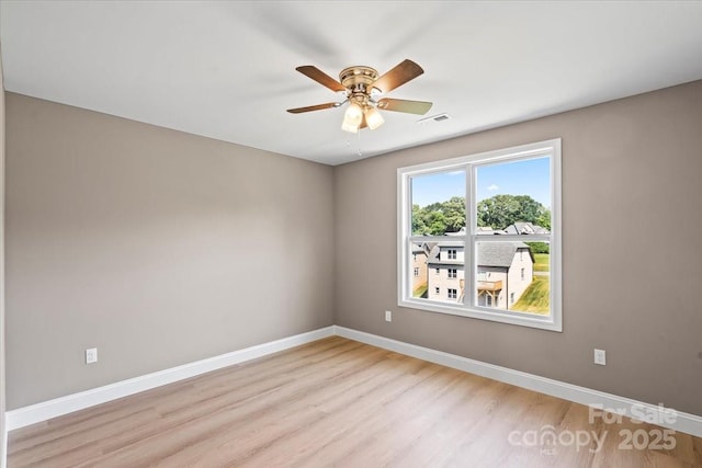 1033 12th Avenue Dr NW, Hickory, NC 28601 - empty room featuring light wood-style floors and ceiling fan