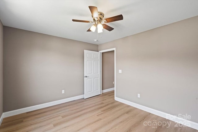 1033 12th Avenue Dr NW, Hickory, NC 28601 - empty room featuring light wood finished floors and ceiling fan