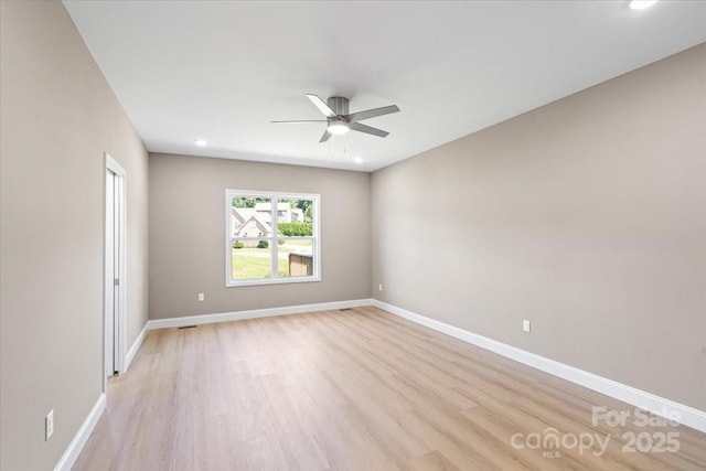 1033 12th Avenue Dr NW, Hickory, NC 28601 - unfurnished room featuring a ceiling fan, light wood-type flooring, and recessed lighting