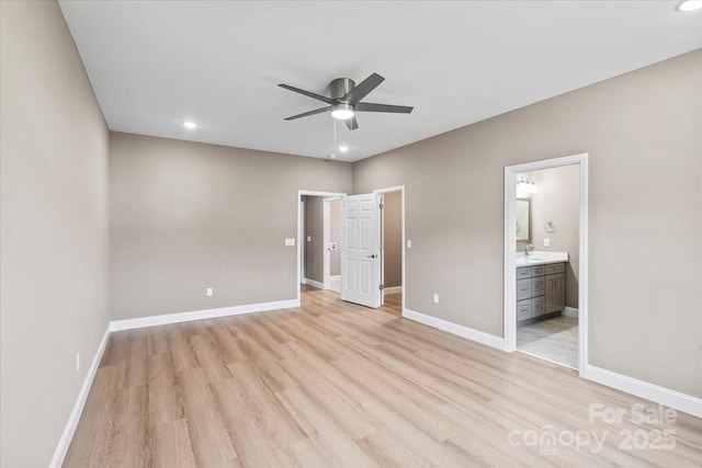1033 12th Avenue Dr NW, Hickory, NC 28601 - unfurnished bedroom featuring light wood-type flooring, ensuite bath, recessed lighting, and ceiling fan