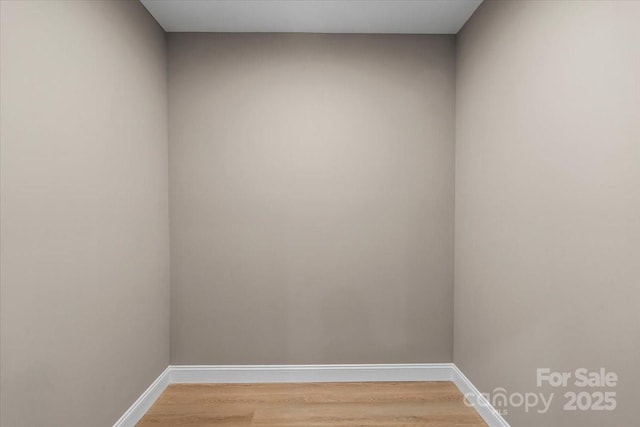 1033 12th Avenue Dr NW, Hickory, NC 28601 - spare room featuring light wood finished floors and baseboards