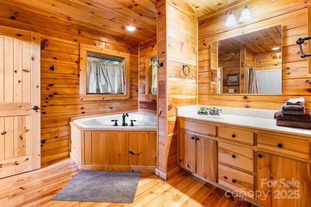 28 Upper Ridge Rd, Black Mountain, NC 28711 - full bath featuring a garden tub, vanity, wooden walls, wood finished floors, and wood ceiling