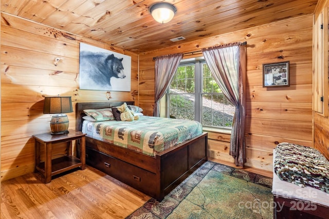 28 Upper Ridge Rd, Black Mountain, NC 28711 - bedroom with wooden ceiling, wooden walls, and wood finished floors