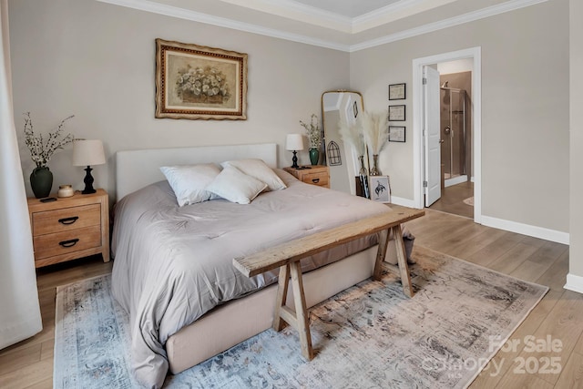 3313 Plum Dr, Monroe, NC 28110 - bedroom with ornamental molding, wood finished floors, and ensuite bath