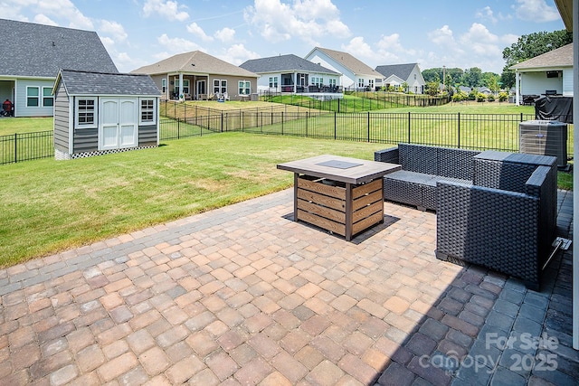 3313 Plum Dr, Monroe, NC 28110 - fenced backyard with a patio, a storage shed, a residential view, and an outdoor living space with a fire pit