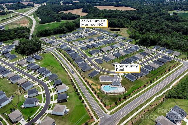 3313 Plum Dr, Monroe, NC 28110 - aerial view of property's location featuring a pool