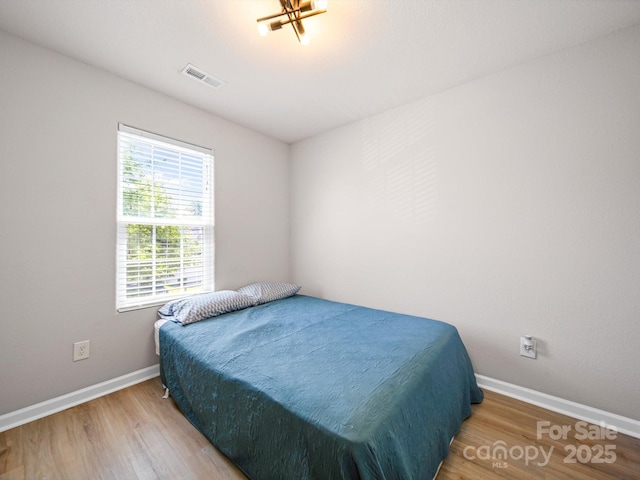 8516 Paw Valley Ln, Charlotte, NC 28214 - bedroom with wood finished floors