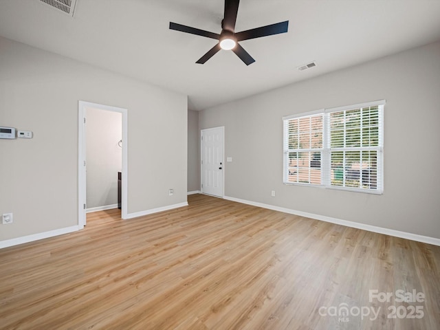 8516 Paw Valley Ln, Charlotte, NC 28214 - spare room with ceiling fan and light wood-style floors
