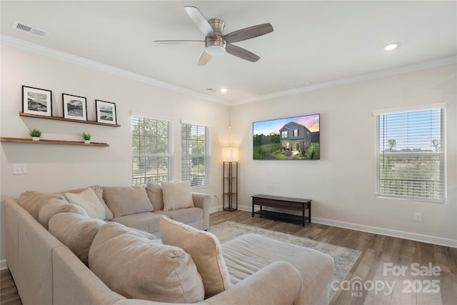 135 Orson Oaks Ln, Pineville, NC 28134 - living room featuring wood finished floors, ceiling fan, crown molding, and recessed lighting