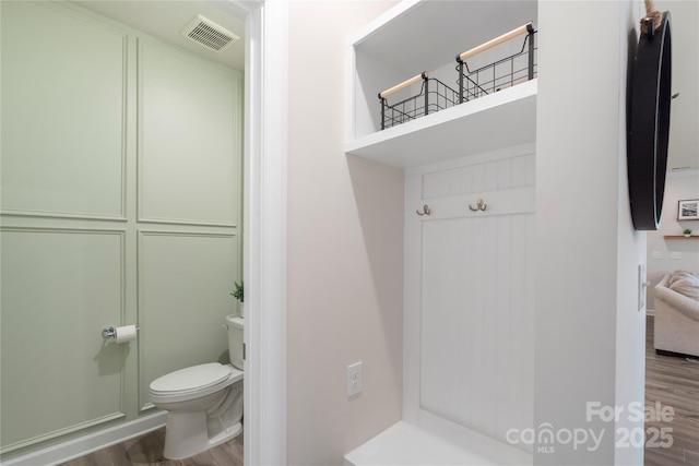 135 Orson Oaks Ln, Pineville, NC 28134 - bathroom with toilet and wood finished floors