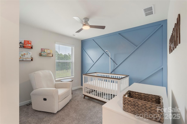 135 Orson Oaks Ln, Pineville, NC 28134 - bedroom with a nursery area, carpet, and a ceiling fan