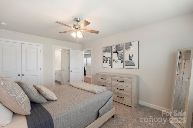 135 Orson Oaks Ln, Pineville, NC 28134 - bedroom featuring a closet, light colored carpet, ceiling fan, and ensuite bathroom