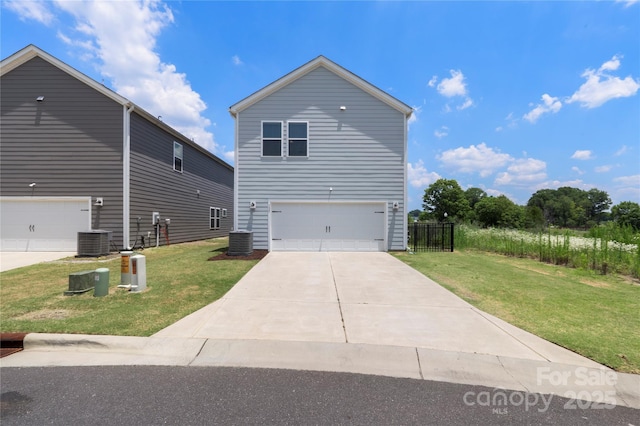 135 Orson Oaks Ln, Pineville, NC 28134 - view of home's exterior with a lawn, an attached garage, and driveway