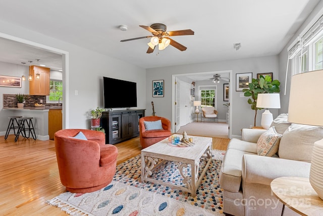10 Daniel Ln, Black Mountain, NC 28711 - living area featuring ceiling fan and light wood-type flooring