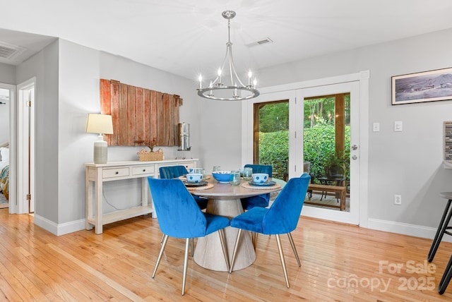 10 Daniel Ln, Black Mountain, NC 28711 - dining space featuring a chandelier and light wood finished floors