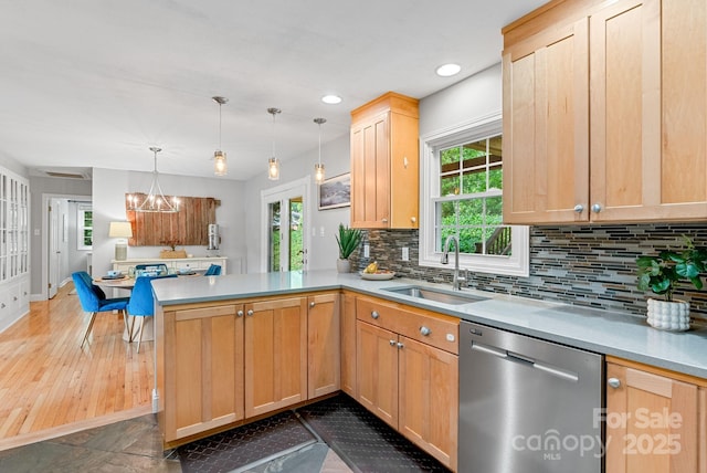 10 Daniel Ln, Black Mountain, NC 28711 - kitchen with dishwasher, a peninsula, tasteful backsplash, a chandelier, and light countertops