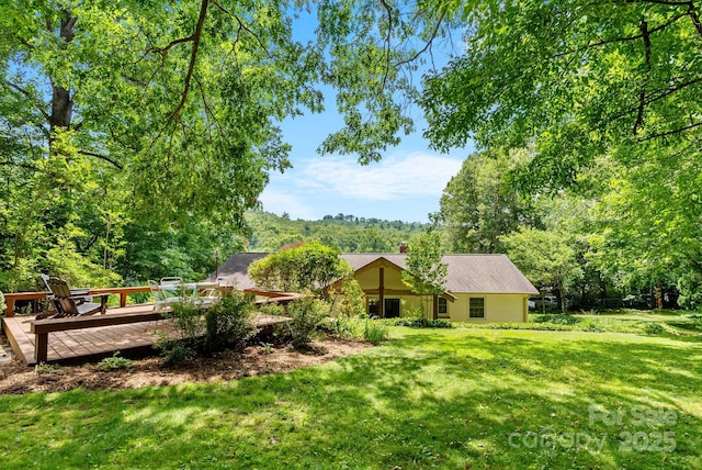 10 Daniel Ln, Black Mountain, NC 28711 - view of green lawn featuring a wooden deck