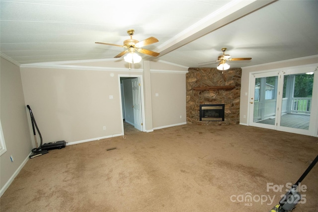 34107 Watson Rd, Albemarle, NC 28001 - unfurnished living room featuring ceiling fan, ornamental molding, carpet floors, and a stone fireplace
