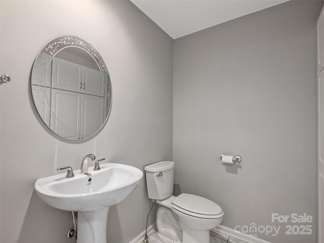 189 Cove Loop Rd, Hendersonville, NC 28739 - bathroom with baseboards and toilet
