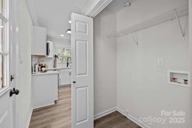 7219 Spring Morning Ln, Charlotte, NC 28227 - washroom featuring hookup for a washing machine, wood finished floors, and recessed lighting
