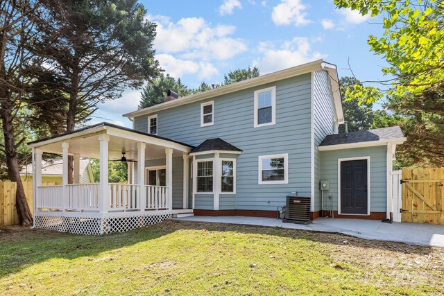7219 Spring Morning Ln, Charlotte, NC 28227 - rear view of property featuring a porch, ceiling fan, a gate, a shingled roof, and a patio area
