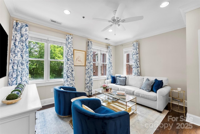 106 N Laurel Ave Unit 118, Charlotte, NC 28207 - living area with healthy amount of natural light, wood finished floors, recessed lighting, crown molding, and a ceiling fan