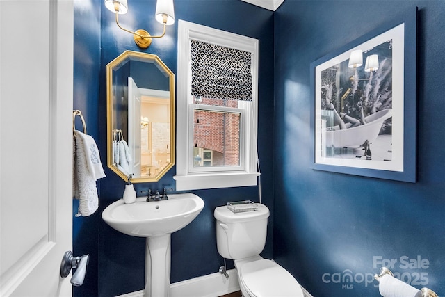 106 N Laurel Ave Unit 118, Charlotte, NC 28207 - bathroom with toilet and baseboards