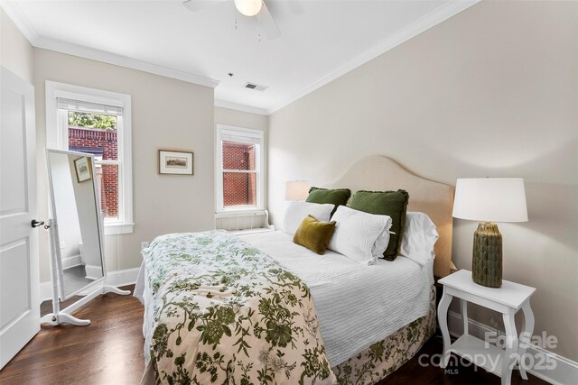 106 N Laurel Ave Unit 118, Charlotte, NC 28207 - bedroom with dark wood-style floors, crown molding, and ceiling fan