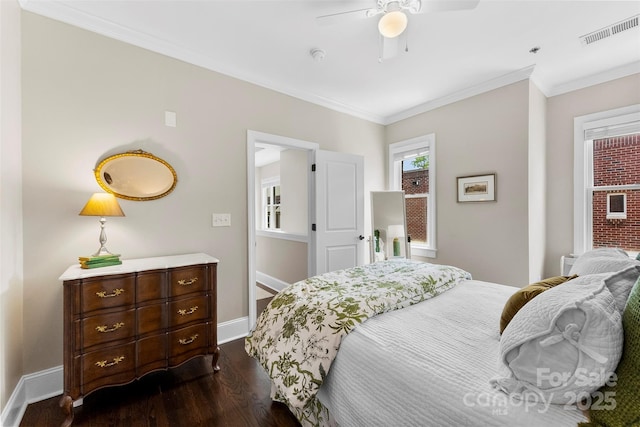 106 N Laurel Ave Unit 118, Charlotte, NC 28207 - bedroom featuring dark wood-style flooring, ornamental molding, and ceiling fan