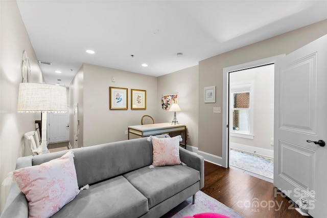 106 N Laurel Ave Unit 118, Charlotte, NC 28207 - living room with dark wood-style flooring and recessed lighting