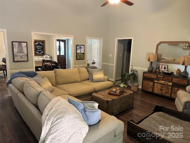 3210 Crow Row, Monroe, NC 28112 - living area with a ceiling fan, a high ceiling, and wood finished floors