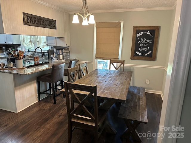3210 Crow Row, Monroe, NC 28112 - dining space with dark wood-style floors, ornamental molding, and a chandelier