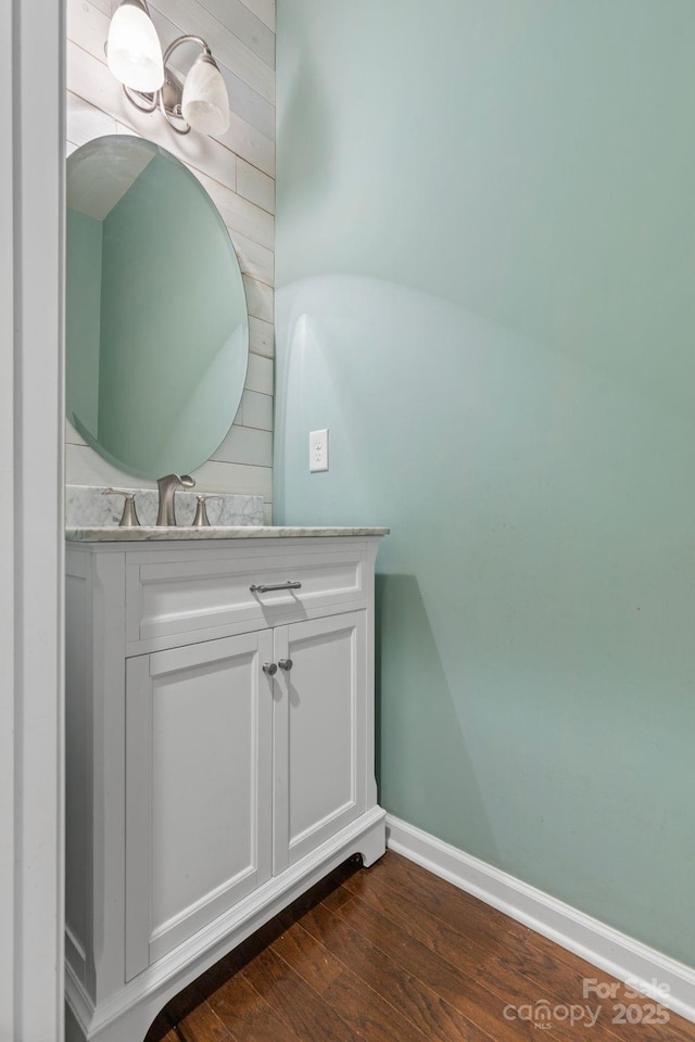 159 E Warfield Dr, Mooresville, NC 28115 - bathroom featuring a chandelier, wood finished floors, and vanity